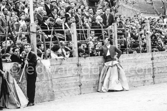 Bullfight put on in Pablo Picasso\'s honor (80th birthday). Luis Miguel Dominguin before the fight. On the left a man preparing the sword for Dominguin. The Bullfighters Dominguin and Domingo Ortega killed a bull but this was forbidden in France. Pablo Picasso paid the fine of 5000 Francs. Vallauris 29.10.1961. - Photo by Edward Quinn