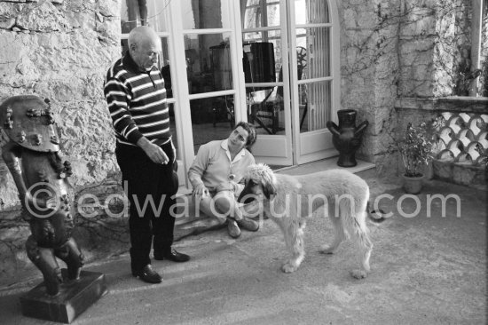 Pablo Picasso and Jacqueline with Afghan dog Kaboul on the terrace in front of the entrance to Mas Notre-Dame-de-Vie, Mougins 14.2.1962. - Photo by Edward Quinn