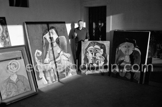 Pablo Picasso with his paintings and a work of his private collection by Joan Miró. Mas Notre-Dame-de-Vie, Mougins 1962. - Photo by Edward Quinn
