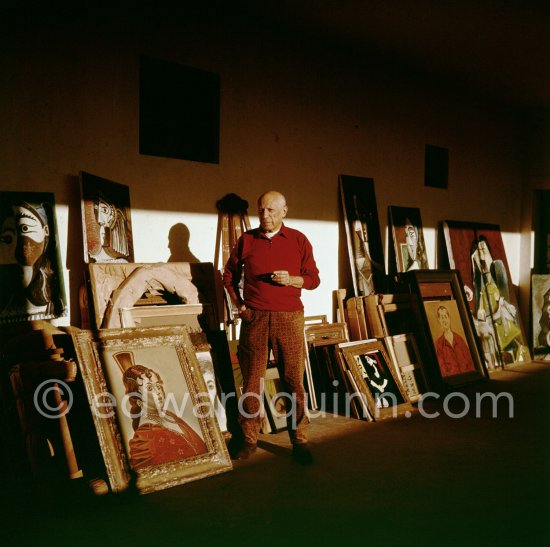 Pablo Picasso with his paintings and a work of his private collection by Joan Miró. Mas Notre-Dame-de-Vie, Mougins 1962. - Photo by Edward Quinn