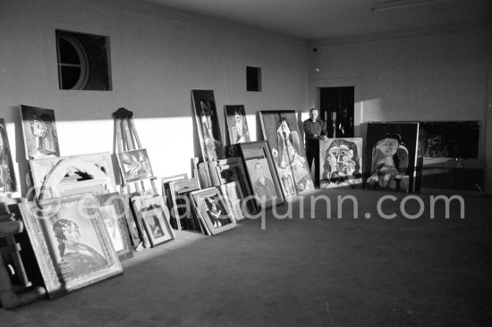 Pablo Picasso with his paintings and two works of his private collection by Joan Miró. Mas Notre-Dame-de-Vie, Mougins 1962. - Photo by Edward Quinn