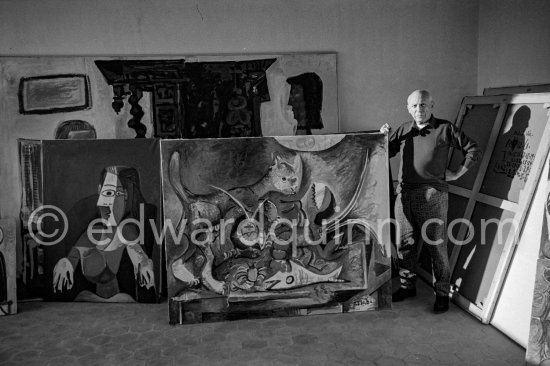 Pablo Picasso stands beside a painting he has just finished. Mas Notre-Dame-de-Vie, Mougins 1962. - Photo by Edward Quinn