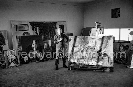 Pablo Picasso stands beside a painting he has just finished. Mas Notre-Dame-de-Vie, Mougins 1962. - Photo by Edward Quinn