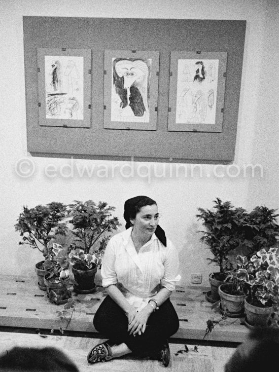 Jacqueline at the exposition "Les Déjeuners". Dessins originaux de Pablo Picasso, Galerie Madoura. Cannes 1962. - Photo by Edward Quinn