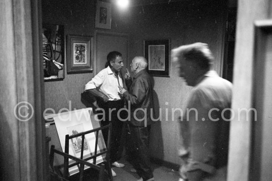 André Verdet and Pablo Picasso. On the right Edouard Pignon. Soshana Afroyim\'s exhibition in the Château Grimaldi in Antibes, France, 1962. - Photo by Edward Quinn