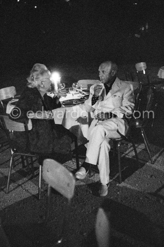 Pablo Picasso and unknown lady. Opening of Zadkine exhibition at Galerie Madoura. Vallauris 1963. - Photo by Edward Quinn