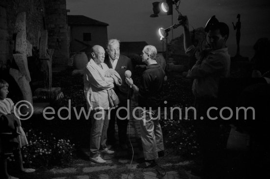 Pablo Picasso and Prévert interviewed for a radio program. Opening of exhibition "Images de Jacques Prévert", Château Grimaldi, Antibes, 6.8.1963. - Photo by Edward Quinn