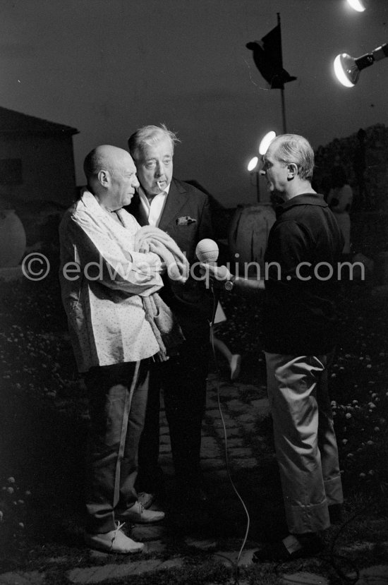 Pablo Picasso and Prévert interviewed for a radio program. Opening of exhibition "Images de Jacques Prévert", Château Grimaldi, Antibes, 6.8.1963. - Photo by Edward Quinn