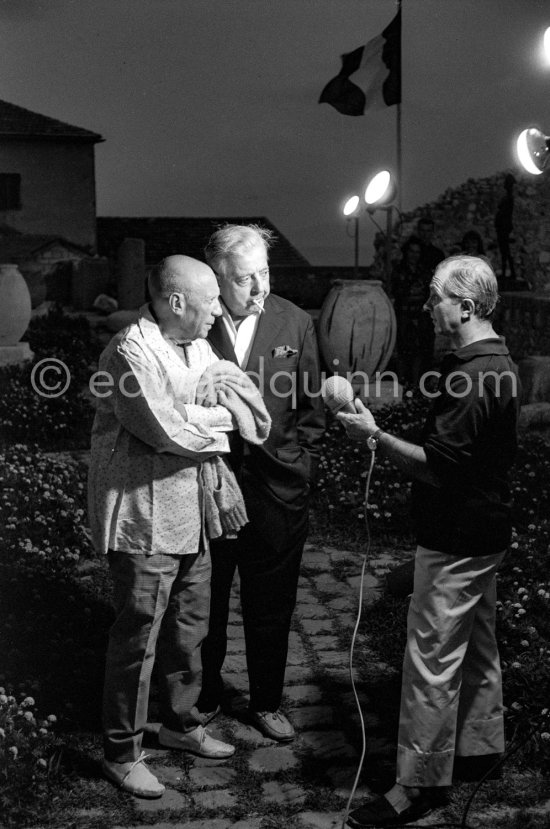 Pablo Picasso and Prévert interviewed for a radio program. Opening of exhibition "Images de Jacques Prévert", Château Grimaldi, Antibes, 6.8.1963. - Photo by Edward Quinn
