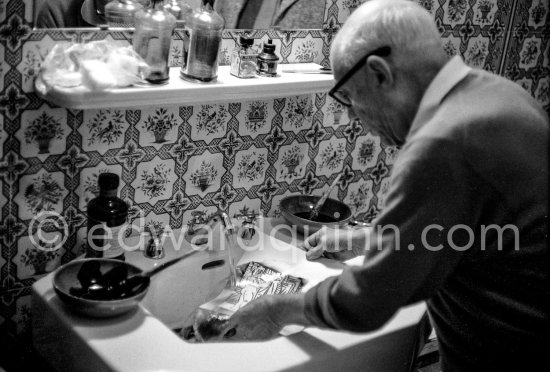 Pablo Picasso washing a linocut print to remove surplus ink. Even though he was nearly eighty at the time he did this work, he enjoyed the physical effort and the adventure. Mas Notre-Dame-de-Vie, Mougins 1964. - Photo by Edward Quinn
