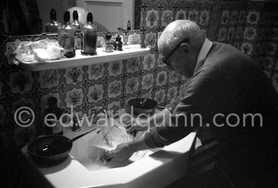 Pablo Picasso washing a linocut print to remove surplus ink. Even though he was nearly eighty at the time he did this work, he enjoyed the physical effort and the adventure. Mas Notre-Dame-de-Vie, Mougins 1964. - Photo by Edward Quinn