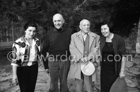 Pablo Picasso, Jacqueline and Dr. Jacques Hepp, the surgeon who operated on him, and his wife Myriam. In the gardens of Mas Notre-Dame-de-Vie. First photos after surgery at British-American Hospital in Paris. Mougins 1965. - Photo by Edward Quinn