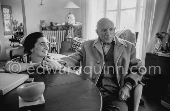 Jacqueline holding Pablo Picasso's hand. One of the first photos after his surgery at the British-American Hospital in Paris. Notre-Dame-De-Vie, Mougins 1965. - Photo by Edward Quinn