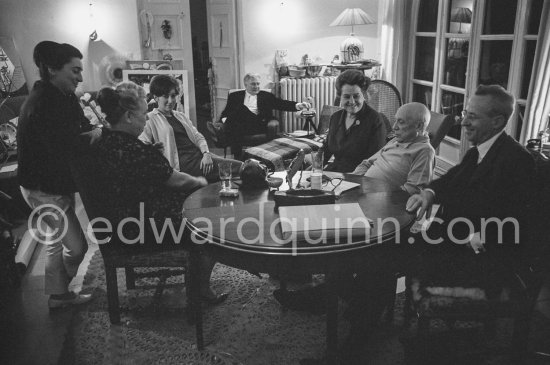 Birthday of Jacqueline (24.2.66). Jacqueline, Spanish publisher Gustavo Gili and his wife, Anna Maria Torra Amat, Edouard Pignon, Hélène Parmelin, Sylvie, Pablo Picasso\'s nurse. Mas Notre-Dame-de-Vie 1966. - Photo by Edward Quinn