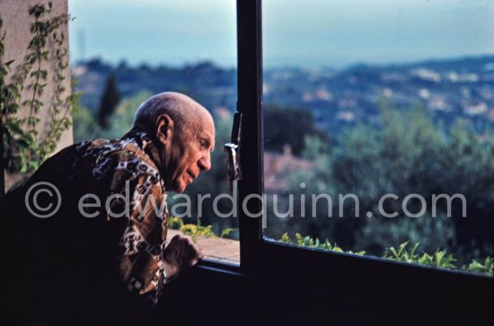 Pablo Picasso on a window of one of the studios he added to Mas Notre-Dame-de-Vie, Mougins 1967 - Photo by Edward Quinn