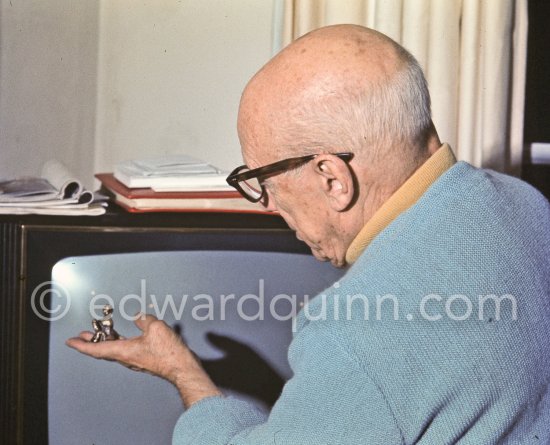 Pablo Picasso holding a small erotic bronze, Priapus, inspired by some primitive sculptures that had always interested and intrigued him. Mas Notre-Dame-de-Vie, Mougins 1969. - Photo by Edward Quinn