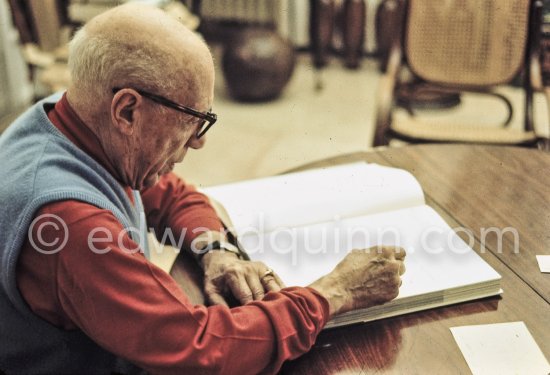 Pablo Picasso dedicating a book. Mas Notre-Dame-de-Vie, Mougins 1970. - Photo by Edward Quinn