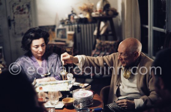 Pablo Picasso and Jacqueline. He rings a little Indian bell which Quinn brought Quinn from Ireland. One of the last photos of Pablo Picasso by Edward Quinn. (Scenes in the documentary film "Pablo Picasso l'homme et son oeuvre" by Edward Quinn). Mas Notre-Dame-de-Vie, Mougins 7. Jan 1972. - Photo by Edward Quinn