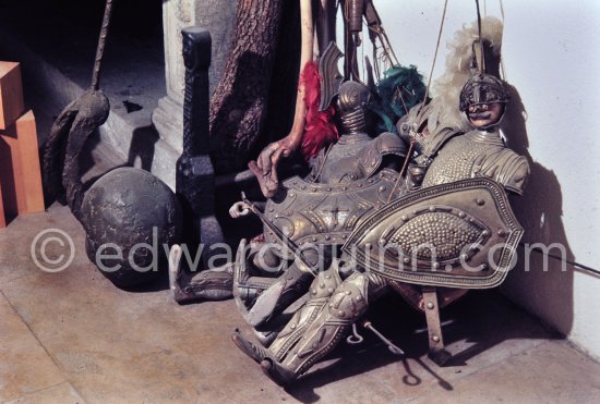 Sicilian marionette in golden armour, "Femme enceinte" and "Tête de mort". Studio de la sculpture. Ground floor, Mas Notre-Dame-de-Vie, Mougins 1974. (Photographed after Pablo Picasso’s death.) - Photo by Edward Quinn