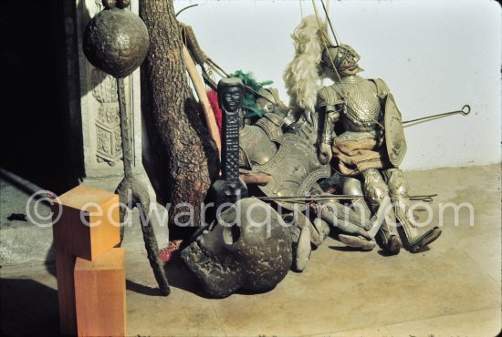 Sicilian marionette in golden armour, "Femme enceinte" and "Tête de mort". Studio de la sculpture. Ground floor, Mas Notre-Dame-de-Vie, Mougins 1974. (Photographed after Pablo Picasso’s death.) - Photo by Edward Quinn