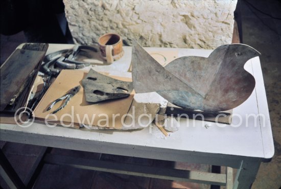 A dove cut out of metal, a sheet metal mask, and some of Pablo Picasso’s tools. Studio de la sculpture. Ground floor, Mas Notre-Dame-de-Vie, Mougins 1974. (Photographed after Pablo Picasso’s death.) - Photo by Edward Quinn