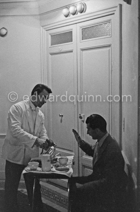 Edward Quinn and a photographer friend waiting in Carlton Hotel right outside the door of Kim Novak\'s room. Cannes 1956. - Photo by Edward Quinn