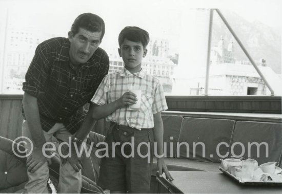 Edward Quinn and Alexander Onassis on board Onassis\' Yacht Christina. Monaco harbor 1957. - Photo by Edward Quinn