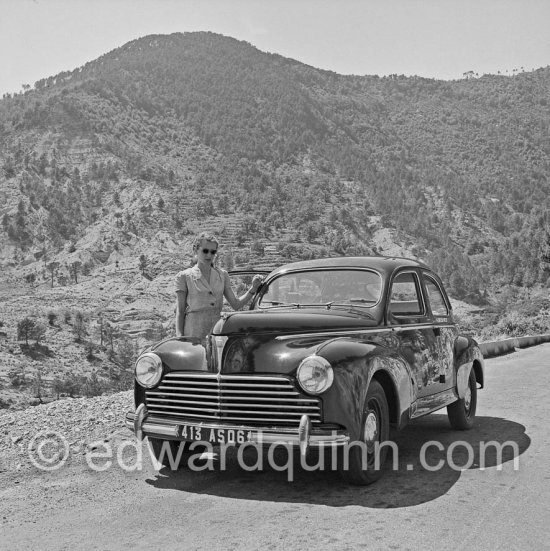 Gret Quinn in Quinn\'s Peugeot 203. Near Nice, about 1953. - Photo by Edward Quinn