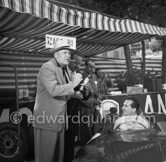 Alberto Ascari in Lancia D24 Spider Sport during filming of "The Racers" in Lancia D24. Director Henry Hathaway (with hat). Monaco 1954. - Photo by Edward Quinn