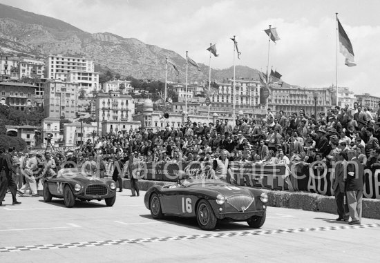 During filming of "The Racers": Lance Macklin, (16) Austin-Healey 100, Ferrari 212 Export Touring Barchetta, 0104E 52 upgraded to 225 specs, 1955. Behind the Healey Director Henry Hathaway. Monaco 1954. - Photo by Edward Quinn