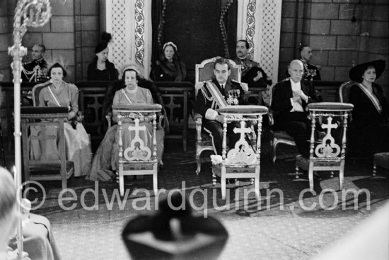 Prince Rainier of Monaco during the religious ceremony celebrating his accession to the throne. From left his sister Princess Antoinette, his mother Princess Charlotte, Prince Rainier, his father, Prince Pierre de Polignac. Monaco 1950 - Photo by Edward Quinn