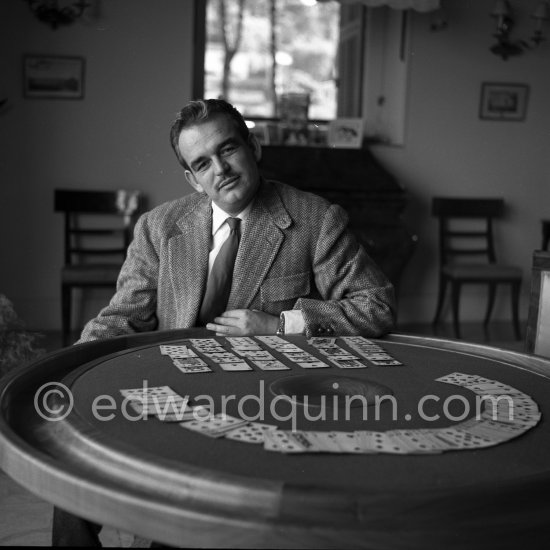 Prince Rainier of Monaco playing cards at Villa Iberia, Saint-Jean-Cap-Ferrat 1954. - Photo by Edward Quinn