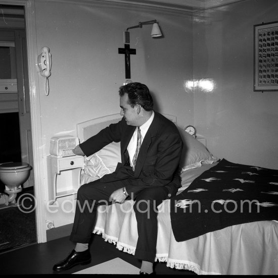 Prince Rainier in the private apartment of his luxury yacht Deo Juvante II anchored in Monaco harbor, 1953. - Photo by Edward Quinn