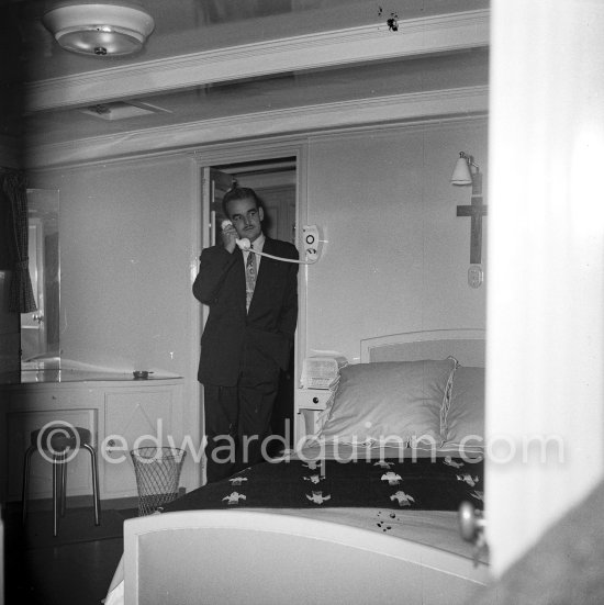 Prince Rainier in the private apartment of his luxury yacht Deo Juvante II anchored in Monaco harbor, 1953. - Photo by Edward Quinn