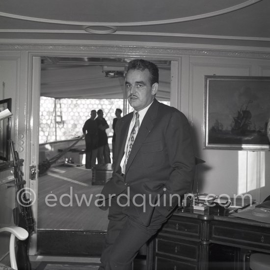 Prince Rainier on board his yacht Deo Juvante II anchored at Monaco harbor, Nov. 1953. - Photo by Edward Quinn