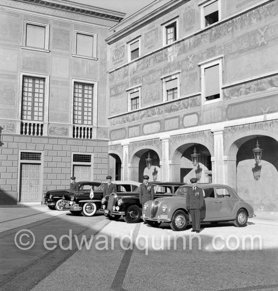 The cars and chauffeurs of Prince Rainier in the court of the Palace. Monaco-Ville 1954. From left:1953 Ford Vedette (Mr. Louche), 1950 Lincoln Cosmopolitan (Mr.Benoit), Mercedes-Benz 300 Limousine (Mr. Raimondo) and Lancia Aurelia B10 Berlina or B21 (RHD) (Mr. Pogliano). - Photo by Edward Quinn