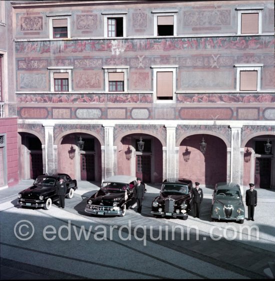 The cars and chauffeurs of Prince Rainier in the court of the Palace. Monaco-Ville 1954. From left:1953 Ford Vedette (Mr. Louche), 1950 Lincoln Cosmopolitan (Mr.Benoit), Mercedes-Benz 300 Limousine (Mr. Raimondo) and Lancia Aurelia B10 Berlina or B21 (RHD) (Mr. Pogliano). - Photo by Edward Quinn