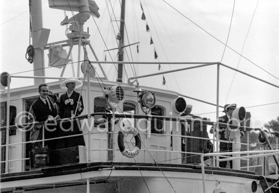 Grace Kelly and Prince Rainier on his yacht Deo Juvante II. She came ashore from the liner S.S. Constitution, which brought her to Monaco for her marriage. Monaco 1956. - Photo by Edward Quinn