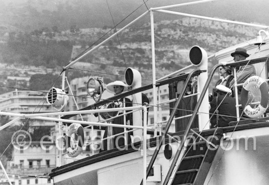 Grace Kelly and Prince Rainier on his yacht Deo Juvante II. She came ashore from the liner S.S. Constitution, which brought her to Monaco for her marriage. Monaco 1956. - Photo by Edward Quinn