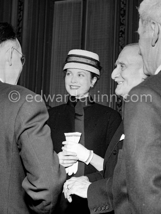 Princess Grace presiding over charity tea at Menton townhall, her first official function in France. Menton 1957. (Grace Kelly) - Photo by Edward Quinn