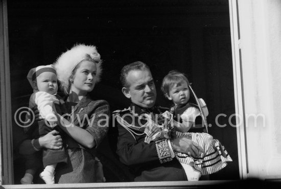 Prince Albert, Princess Caroline, Princess Grace, Prince Rainier. Fête nationale Monégasque at palace window. Monaco-Ville 1958. - Photo by Edward Quinn