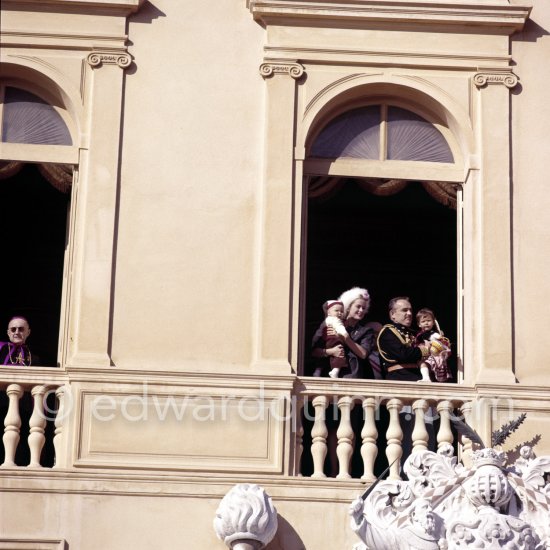 Prince Albert, Princess Caroline, Princess Grace, Prince Rainier. Fête nationale Monégasque, at a palace window. Monaco-Ville 1958. - Photo by Edward Quinn