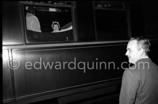 Princess Grace and Caroline leaving by train for Switzerland, seen off by Rainier. Monaco Station 1959. (Grace Kelly) - Photo by Edward Quinn