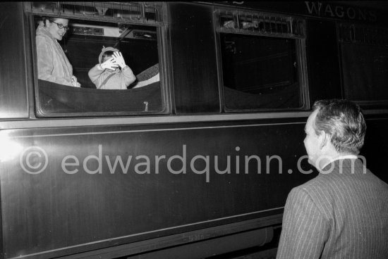 Princess Grace and Caroline leaving by train for Switzerland, seen off by Rainier. Monaco Station 1959. (Grace Kelly) - Photo by Edward Quinn