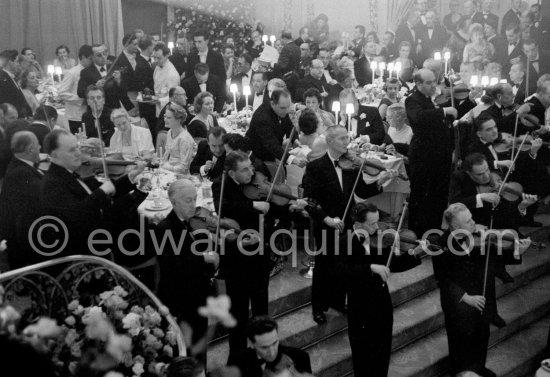 Princess Grace of Monaco (on the left with glasses), her last outing before her second maternity, on the left Prince Pierre, on the right her doctor Dr. Donat. "Bal de la Rose" gala dinner at the International Sporting Club in Monte Carlo, 1958. (Grace Kelly) - Photo by Edward Quinn