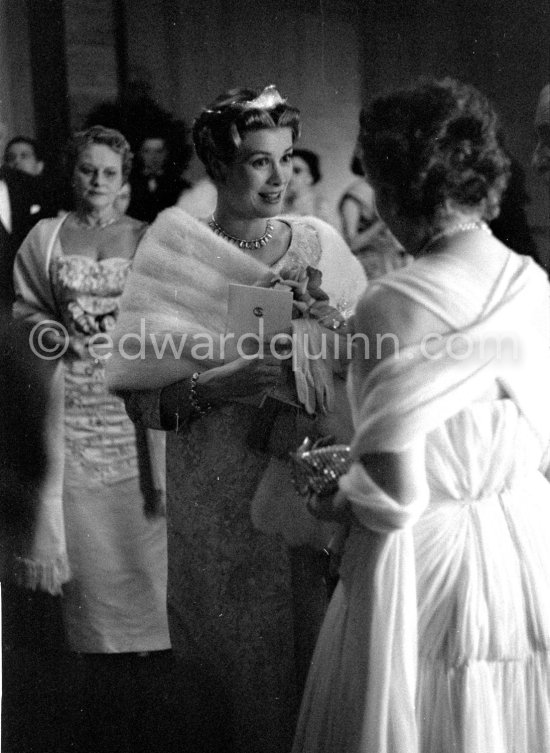 Princess Grace. Her last outing before her second maternity, on the left Prince Pierre, on the right her doctor Dr. Donat. "Bal de la Rose" gala dinner at the International Sporting Club in Monte Carlo 1958. (Grace Kelly) - Photo by Edward Quinn