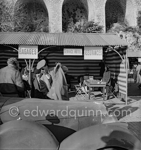 Arrival of participants, luggage storage, hotel service, insurance. In the foerground N° 251 W.T. Franklin / G.C. Franklin on Lagonda V12 Saloon (1939). Rallye Monte Carlo 1951. - Photo by Edward Quinn