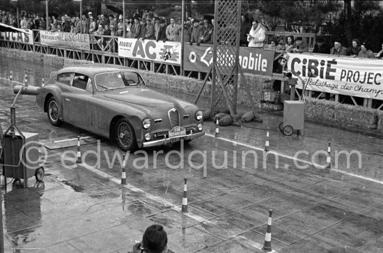 N° 114 Louis Chiron / N. Mahé on Delahaye 175S undergoing the breaking and starting test. Cars will have to accelerate as fast as possible for 200 metres from a standing start, and then pull up in the shortest possible distance, for the cars have to keep a line between the axles. Rallye Monte Carlo 1951. - Photo by Edward Quinn