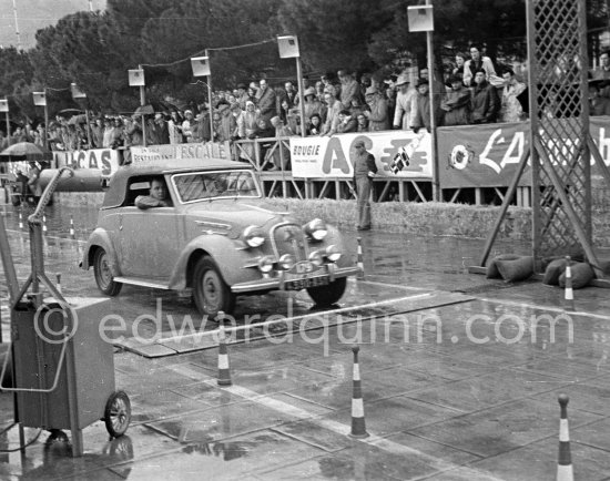 N° 179 Revis / Brunet on Simca 8 1200 Cabriolet, undergoing the breaking and starting test. Cars will have to accelerate as fast as possible for 200 metres from a standing start, and then pull up in the shortest possible distance, for the cars have to keep a line between the axles. Rallye Monte Carlo 1951. - Photo by Edward Quinn