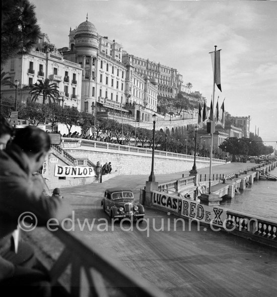 N° 234 McLaughlin / McLaughlin on Riley taking part in the regularity speed test on the circuit of the Monaco Grand Prix. Rallye Monte Carlo 1951. - Photo by Edward Quinn